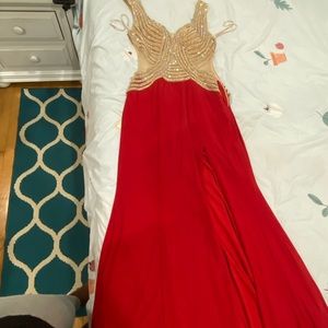 Formal red and gold nude top dress. Left leg high split
